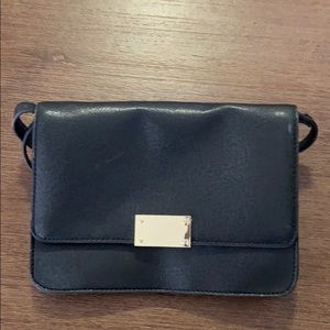 Black purse with magnetic clasp
